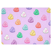 Lavender blanket with pastel sweetheart-style candy hearts and Bulgarian love phrases.