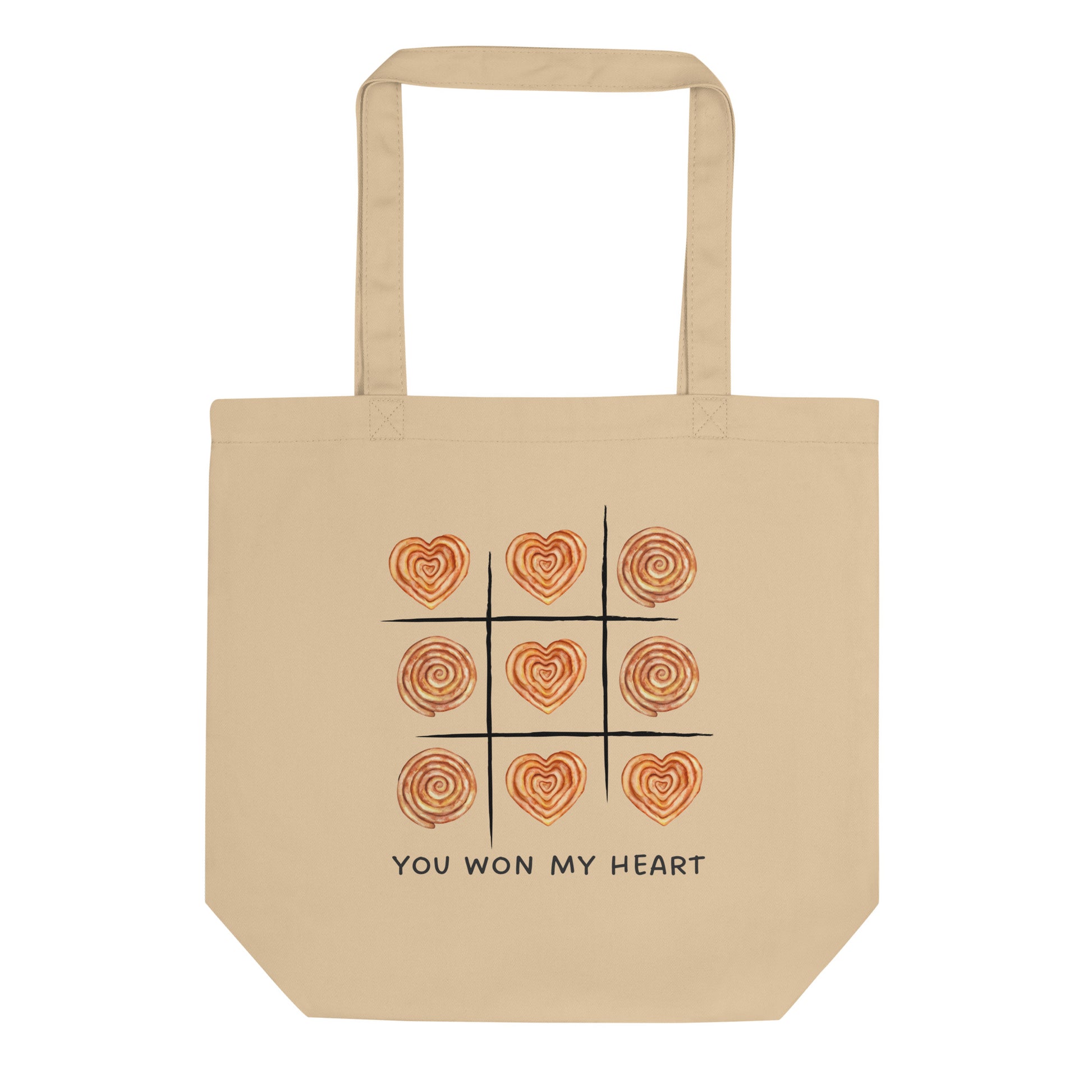 Beige tote bag with heart shaped burek tic tac toe design and text “You Won My Heart”
