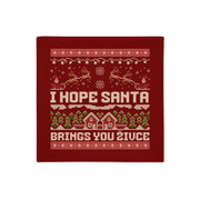 Red knitted-style pillowcase with the phrase “I Hope Santa Brings You Živce.”