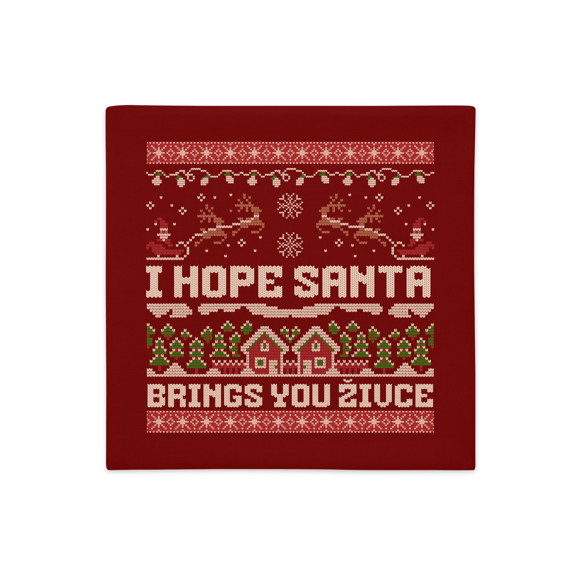 Red knitted-style pillowcase with the phrase “I Hope Santa Brings You Živce.”